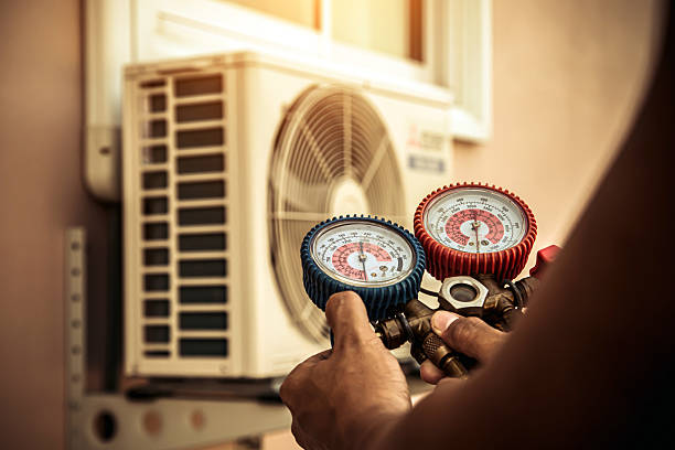 Professional Heat Pump Repair technician working in Fremont, OH